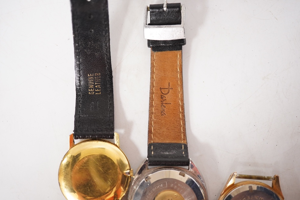 A gentleman's 1940's 9ct gold manual wind wrist watch(a.f.), together with four other wrist watches including Seiko, gold plated Girard Perregaux and Baume & Mercier Baumatic. Condition - poor to fair